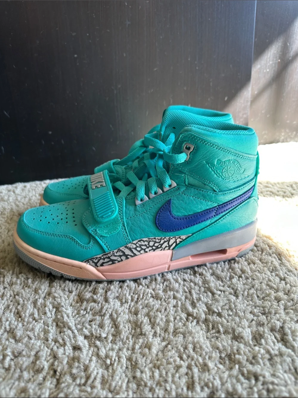 Jordan Nike Teal High-Top Sneakers with Purple Swoosh and Peach Accents